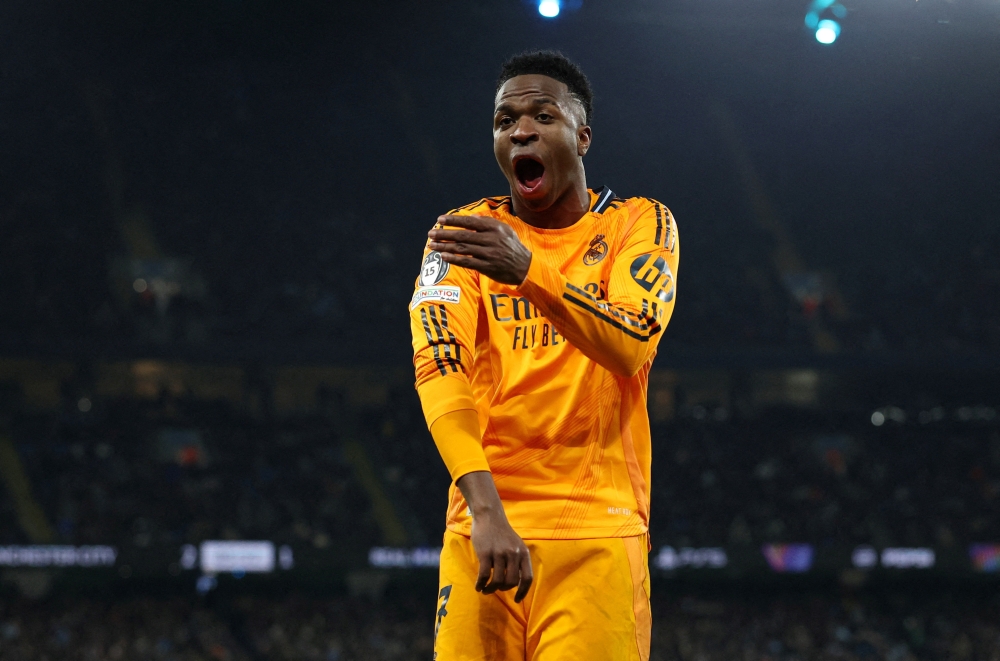 Real Madrid's Vinicius Junior celebrates their second goal scored by Real Madrid's Brahim Diaz v Manchester City in the Champions League,  February 11, 2025. REUTERS