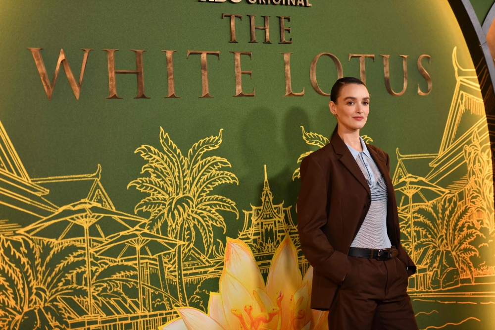 Canadian actress Charlotte Le Bon attends the season three premiere of HBO's "The White Lotus" at Paramount Studios in Los Angeles on February 10, 2025. (Photo by Chris DELMAS / AFP)

