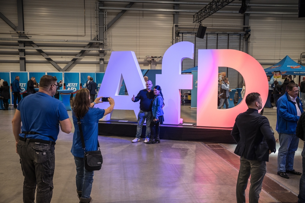 AfD supporters attend the election campaign launch of the Alternative for Germany party in Halle, Germany.