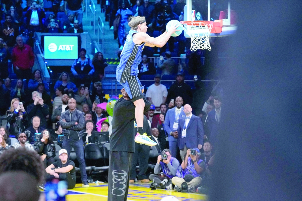 Mac McClung competes in the slam dunk.— Reuters