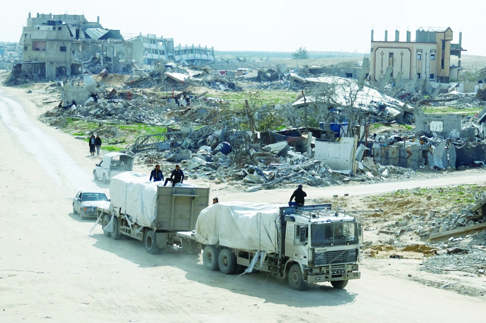 A truck carrying aid drives in Rafah in the southern Gaza Strip. — Reuters