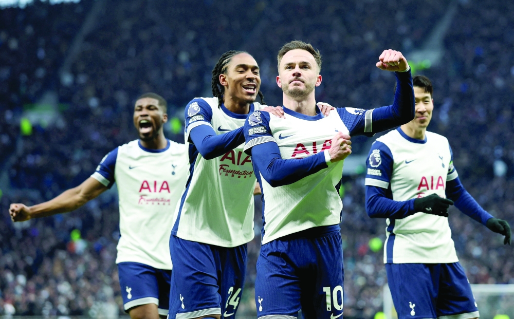 Tottenham Hotspur's James Maddison celebrates scoring their first goal. Reuters