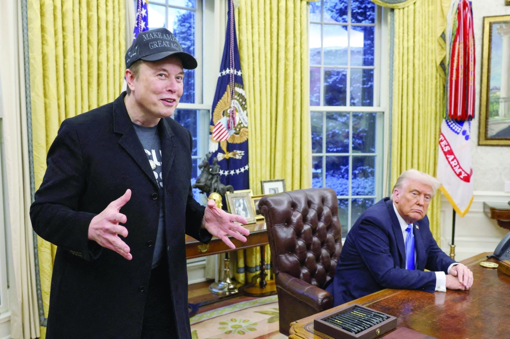 Elon Musk speaks next to US President Donald Trump in the Oval Office of the White House in Washington. — Reuters file photo