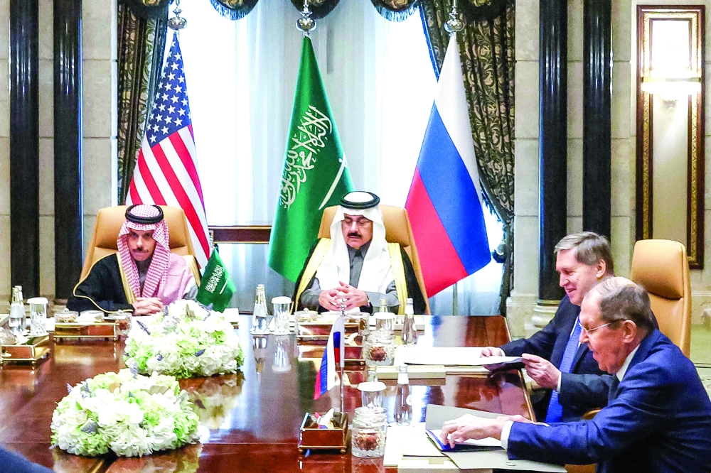 Saudi Arabia's Foreign Minister Prince Faisal bin Farhan al Saud, National Security Adviser Mosaad bin Mohammad al Aiban, the Russian president's foreign policy adviser Yuri Ushakov, and Russia's Foreign Minister Sergei Lavrov attend a meeting with the US Middle East envoy, Secretary of State, and National Security Adviser together at Riyadh's Diriyah Palace on Tuesday. — AFP