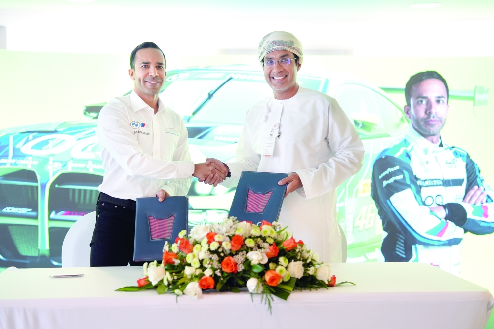 Ahmad al Harthy during the signing ceremony.
