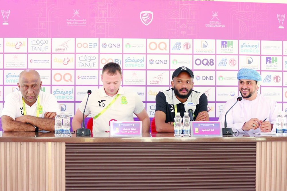 Seeb head coach Nikola Djurovicand captain Eid al Farsi speak to reporters.