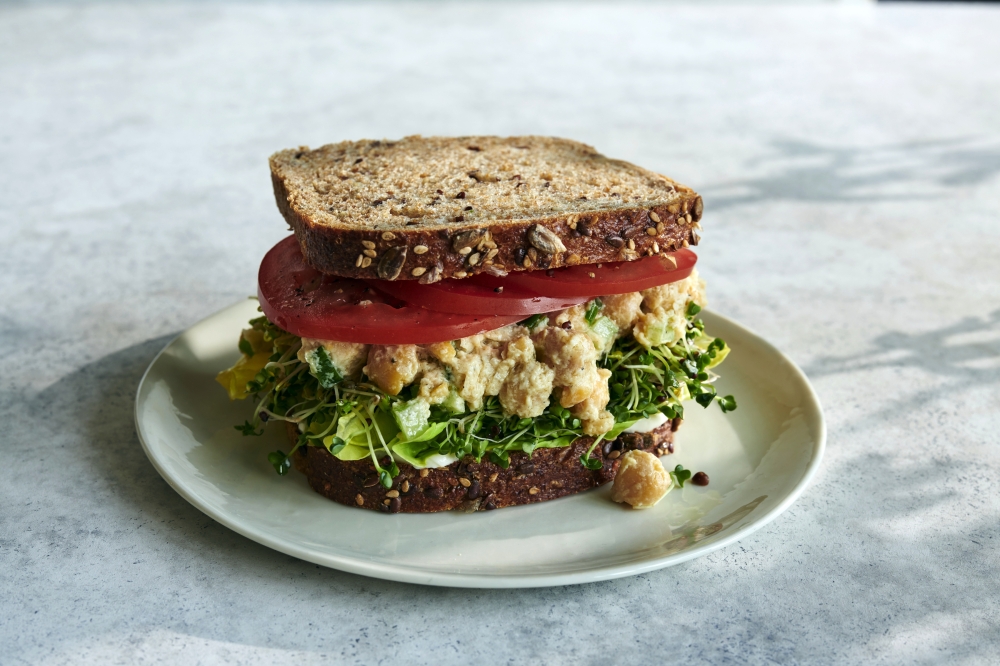 A chickpea salad sandwich. food stylist: Simon Andrews (David Malosh/The New York Times)