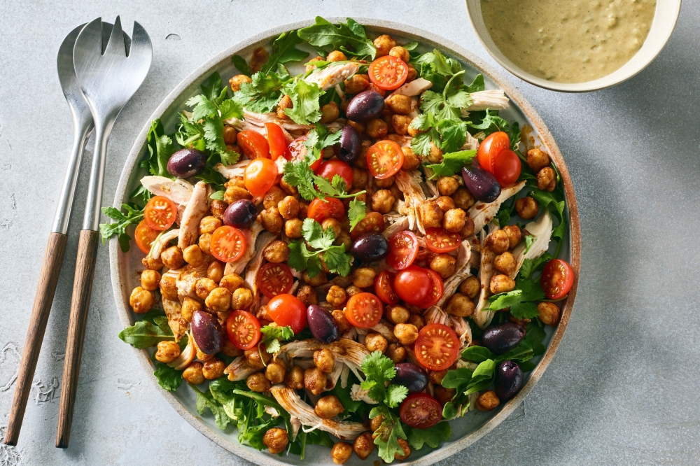A chickpea-chicken salad with green harissa dressing. Food stylist: Maggie Ruggiero (James Ransom/The New York Times)