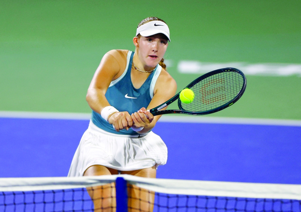 Tennis - Dubai Championships - Dubai Tennis Stadium, Dubai, United Arab Emirates - February 21, 2025 Russia's Mirra Andreeva in action during her semi final match against Kazakhstan's Elena Rybakina REUTERS/Rula Rouhana