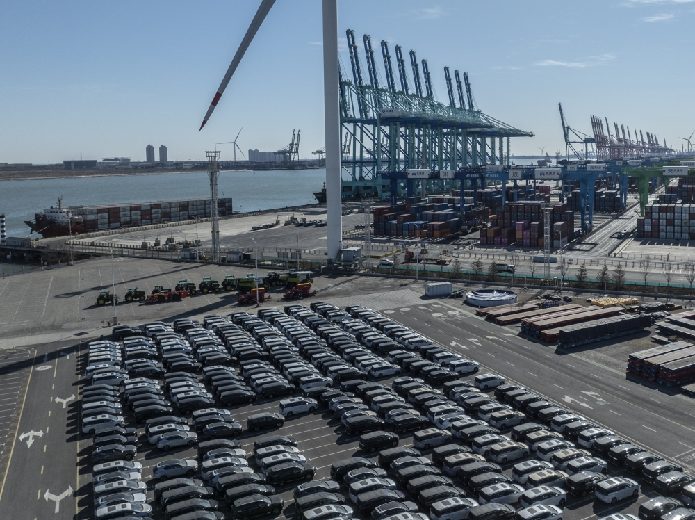 Rows of cars waiting to be shipped at the Port of Tianjin in China, Feb. 4, 2025. (The New York Times)