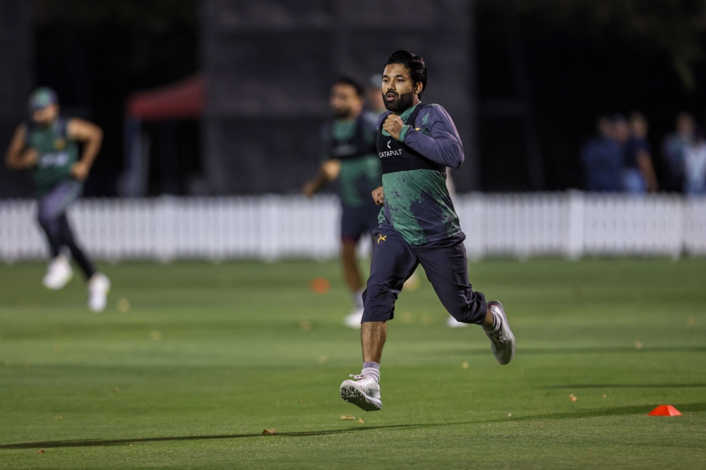 Pakistan's captain Mohammad Rizwan warms up during a practice session at the ICC Academy ground in Dubai