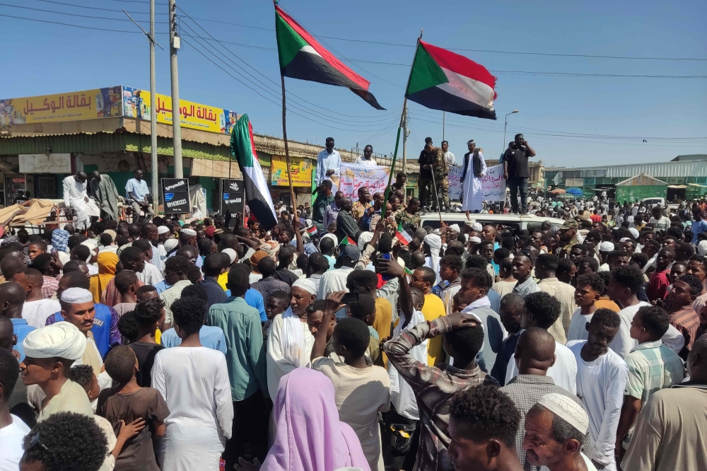 Sudanese attend a protest in support of the army in the eastern city of Gedaref. — AFP 