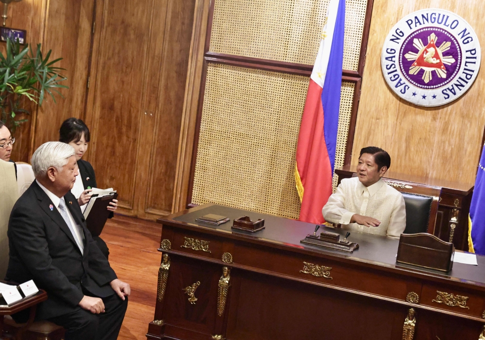 Philippine President Ferdinand Marcos (R) attends a meeting with Japan's Defence Minister Gen Nakatani (L) at the Malakanang presidential palace in Manila. — AFP