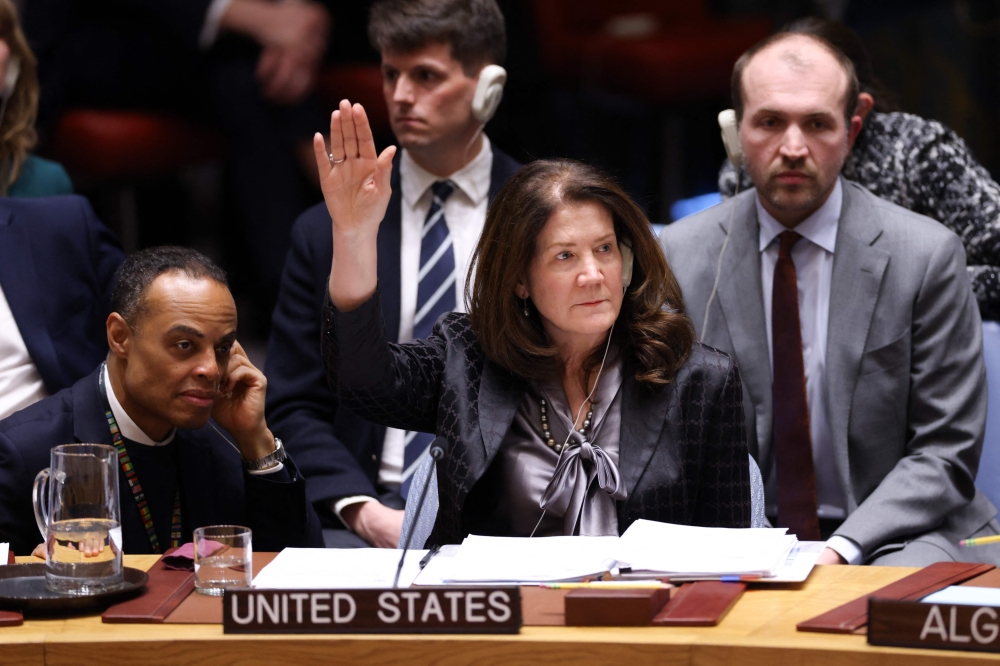 US Deputy Ambassador to the UN, Dorothy Shea, votes during a UN Security Council meeting on a US resolution on Ukraine on the third anniversary of Russia's invasion of Ukraine, at UN Headquarters in New York on Tuesday. — AFP