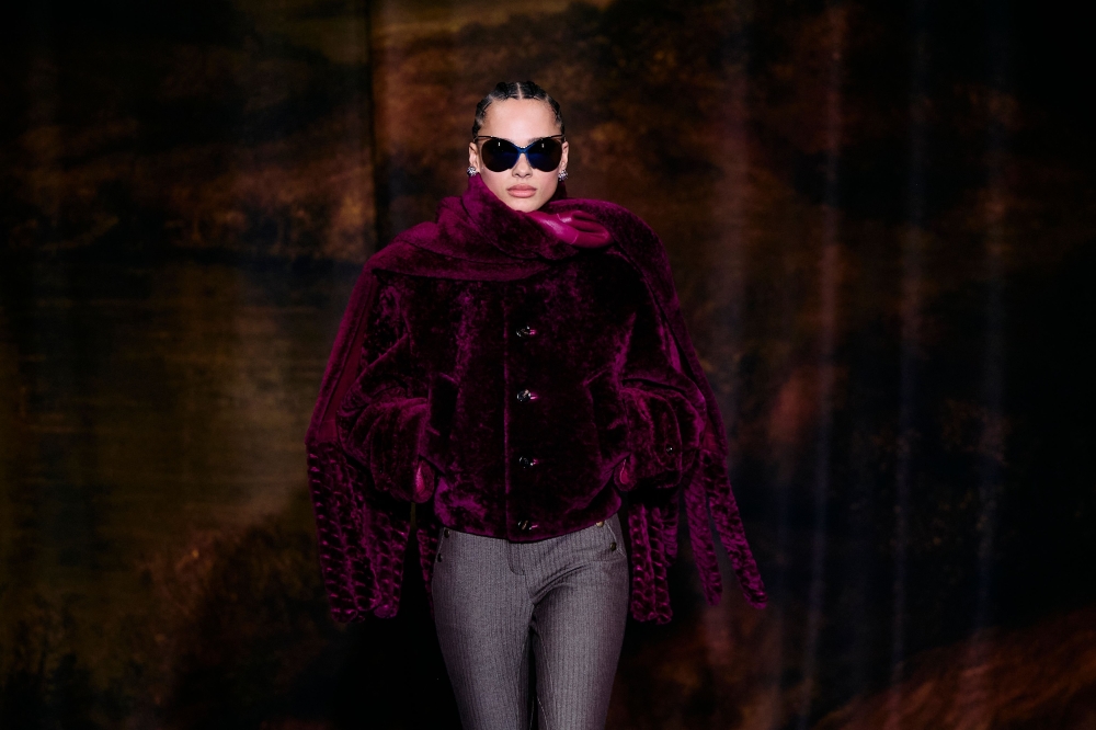 A model presents a creation from Burberry 's Womenswear Fall-Winter 2025-2026 fashion show collection, during London Fashion Week, in London, on February 24, 2025. (Photo by BENJAMIN CREMEL / AFP)

