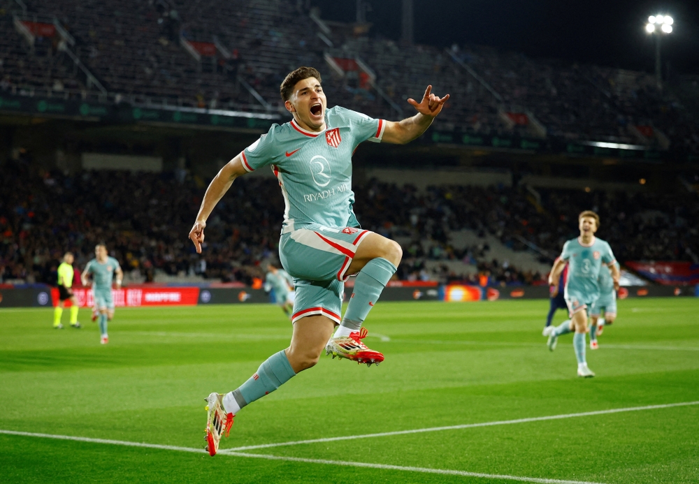 Atletico Madrid's Julian Alvarez celebrates scoring their first goal.— Reuters