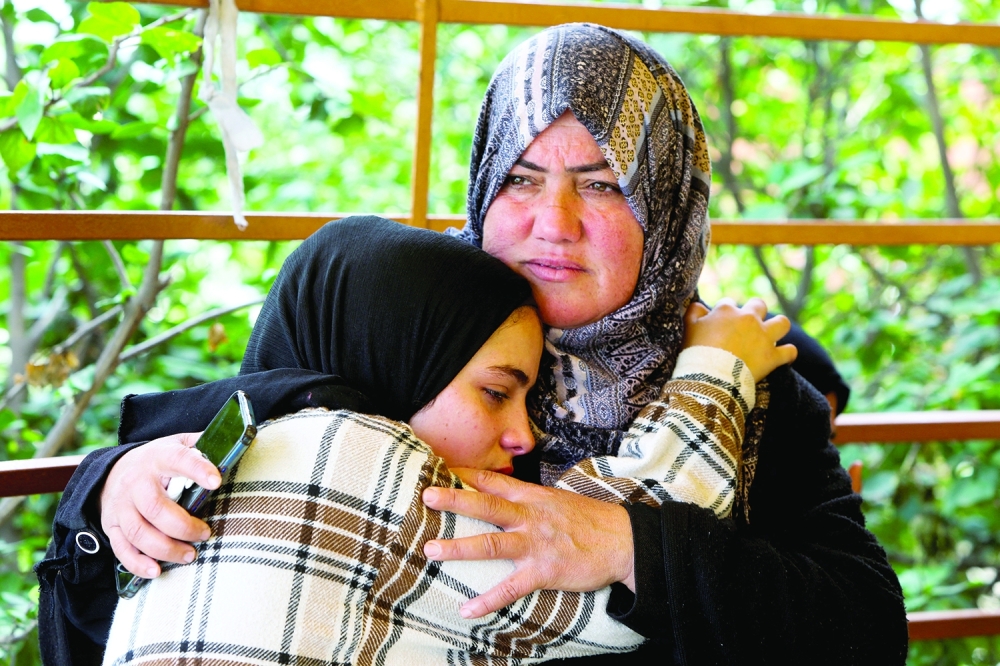 Funeral of two Palestinians killed by Israeli fire, amid impasse over ceasefire deal