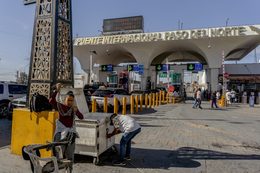 Local merchants packing up at the end of the day at the Paso Del Norte international bridge in Ciudad Juárez, Mexico, Feb. 28, 2025. (Alejandro Cegarra/The New York Times)