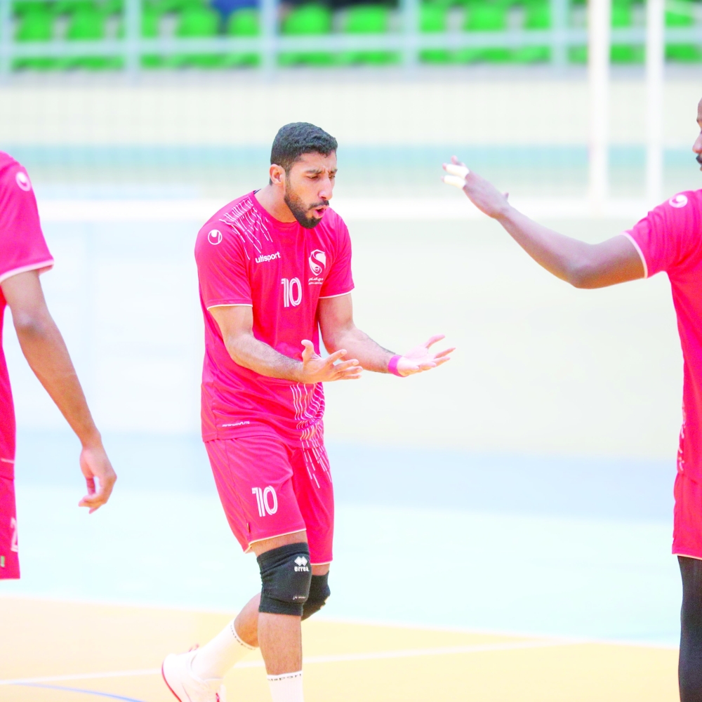 An Al Salam player celebrates a point.