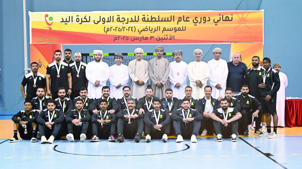 Seeb players pose with their bronze medals.