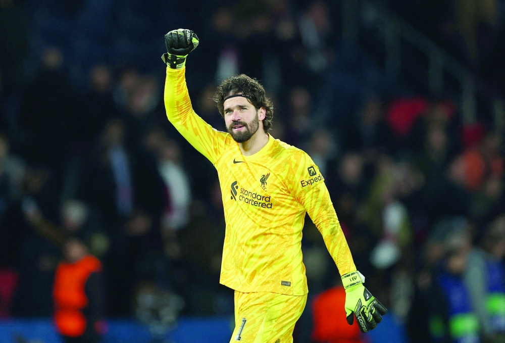  Liverpool's Alisson Becker celebrates after the match REUTERS/Gonzalo Fuentes