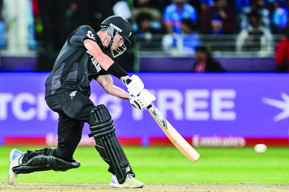 New Zealand's captain Mitchell Santner plays a shot during the ICC Champions Trophy. — AFP