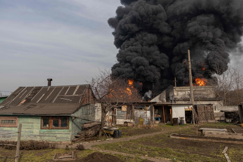 This photograph shows a fire following a strike on the outskirts of Odesa. — AFP