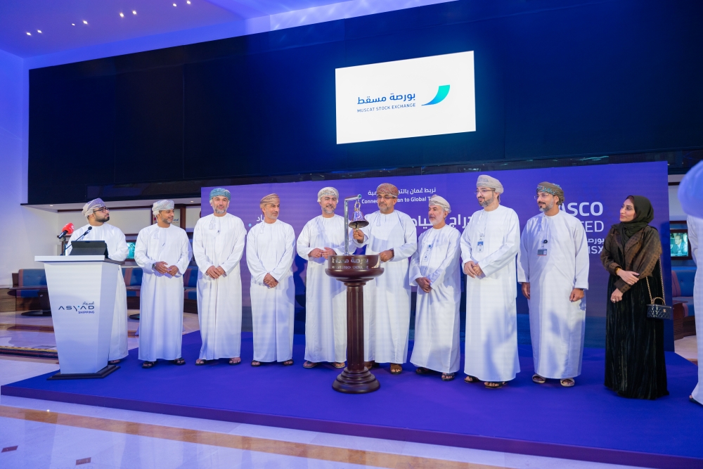 Officials of Asyad Shipping, FSA and MSX at the bell-ringing on Wednesday