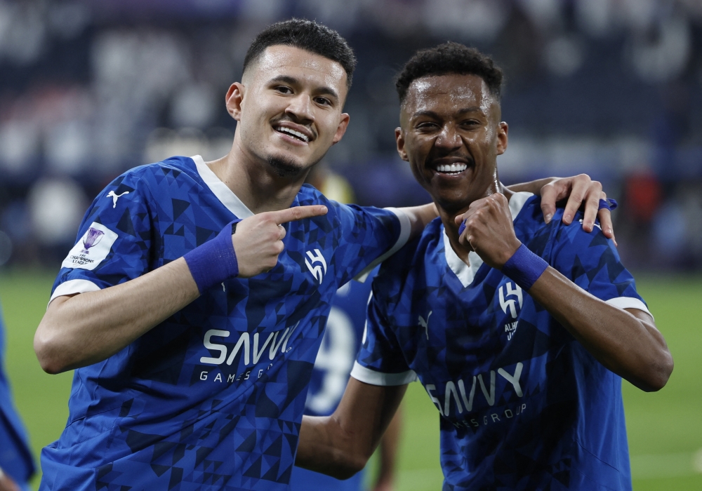 Soccer Football - Asian Champions League - Round of 16 - Second Leg - Al Hilal v Pakhtakor - Kingdom Arena, Riyadh, Saudi Arabia - March 11, 2025 Al Hilal's Nasser Al-Dawsari celebrates scoring their fourth goal with Salem Al-Dawsari REUTERS/Hamad I Mohammed
