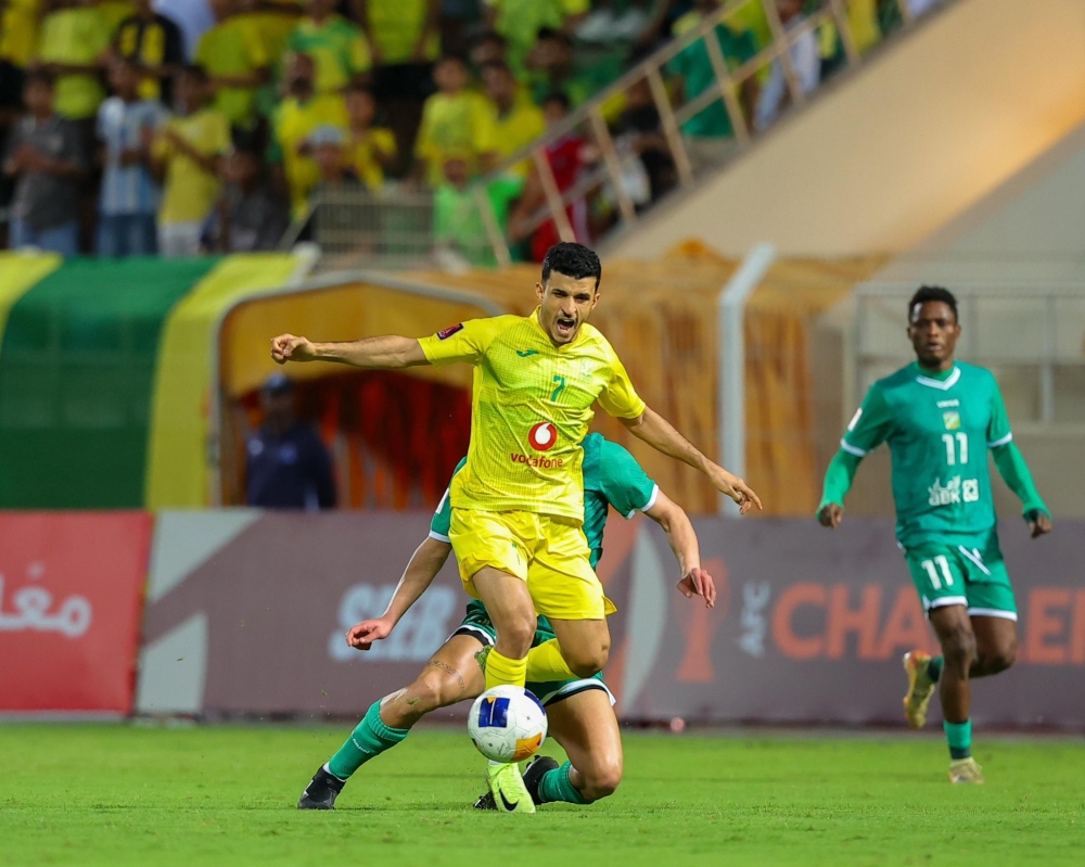 Seeb and Al Arabi players in action at Seeb Stadium.
