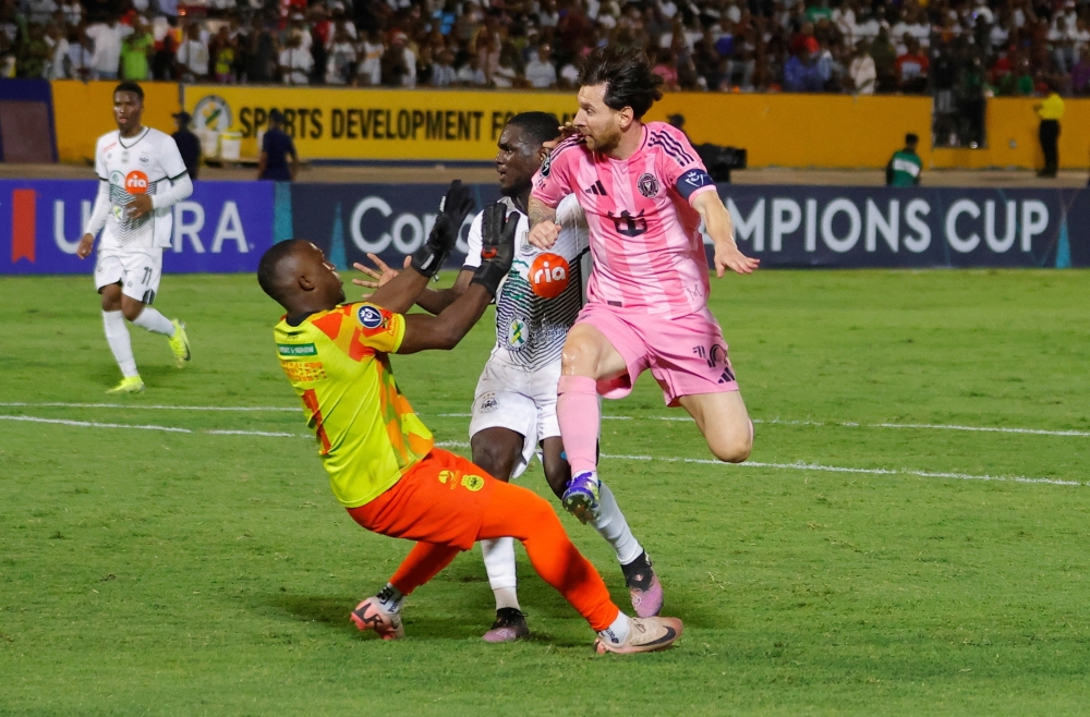 Soccer Football - - National Stadium Independence Park, Kingston, Jamaica - March 13, 2025  Inter Miami's Lionel Messi scores their second goal REUTERS/Gilbert Bellamy
