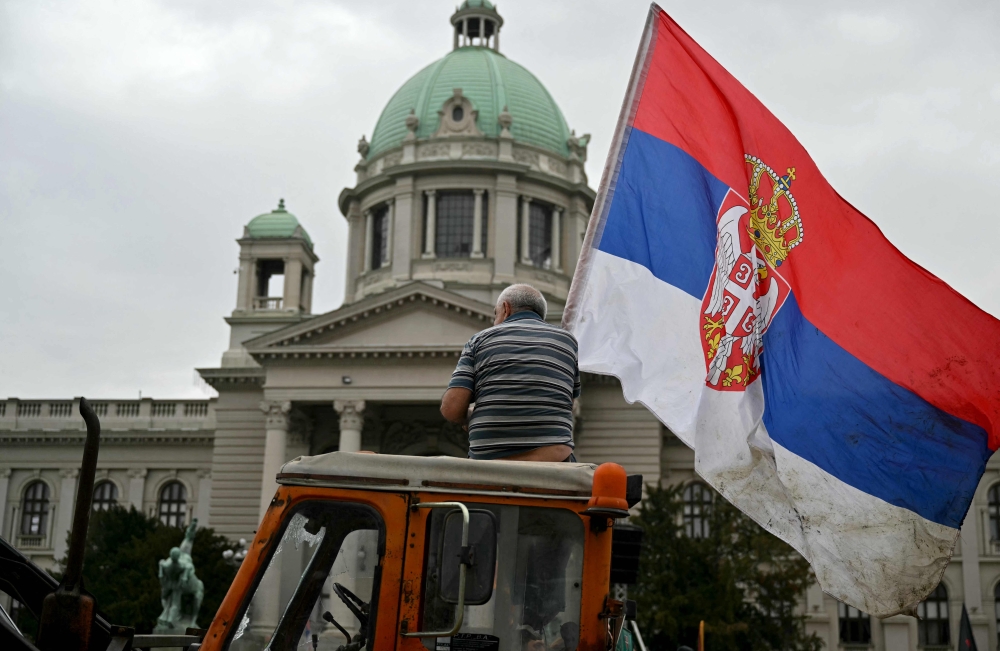 Protesters gather in front of the National Assembly bulilding, in Belgrade.  AFP