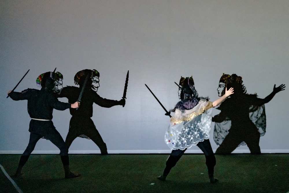 Puppeteers perform a scene from “Song of the North” from backstage at the New Victory Theater in New York, March 11, 2025. (Gavin Doran/The New York Times)