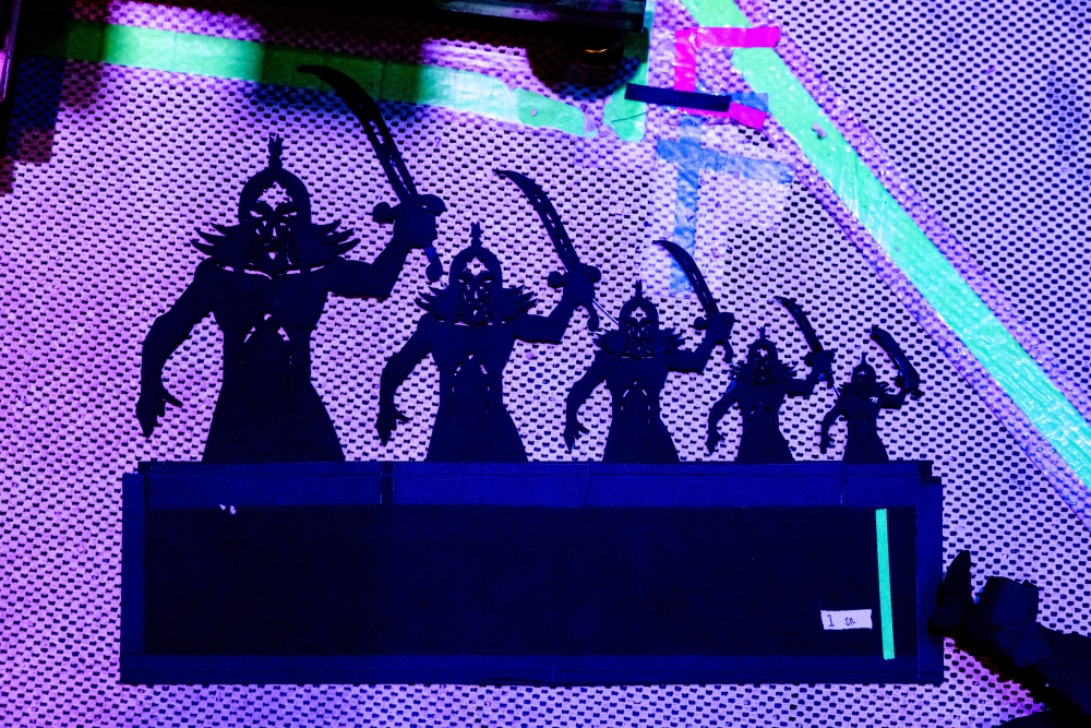 A shadow puppet of warriors used in “Song of the North” at the New Victory Theater in New York, March 11, 2025. (Gavin Doran/The New York Times)