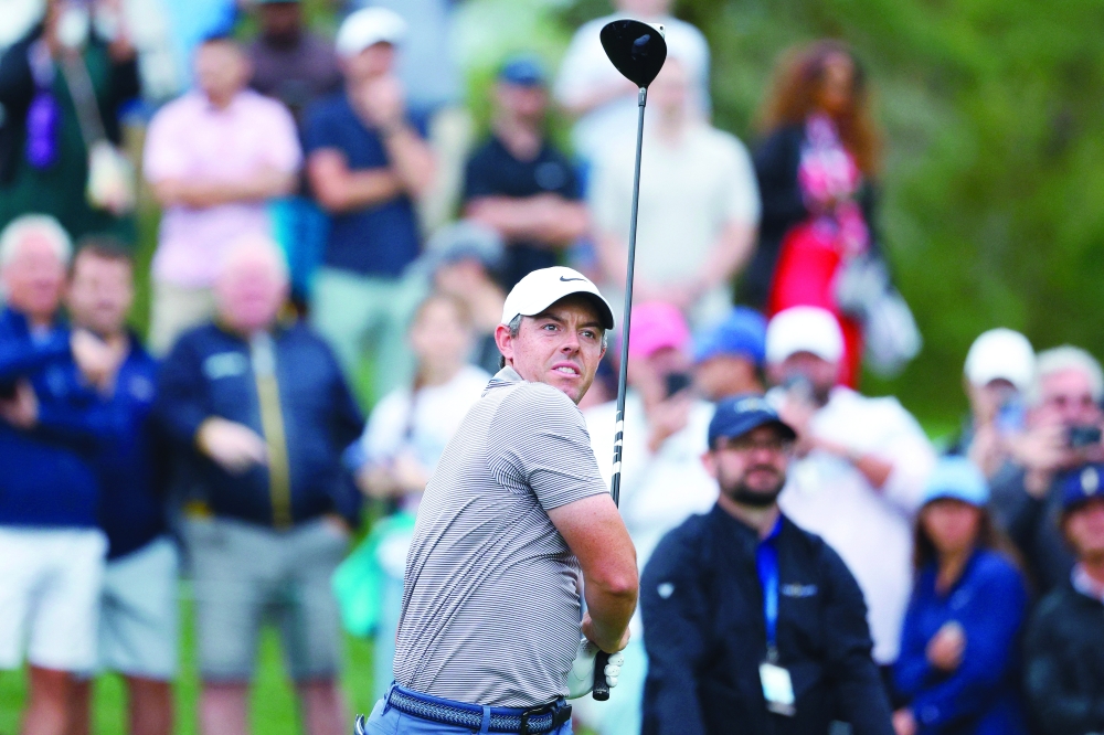 Rory McIlroy watches his drive on the sixteenth tee during the final round of the Players Championship golf tournament at TPC Sawgrass. Mandatory Credit: Jeff Swinger-Imagn Images