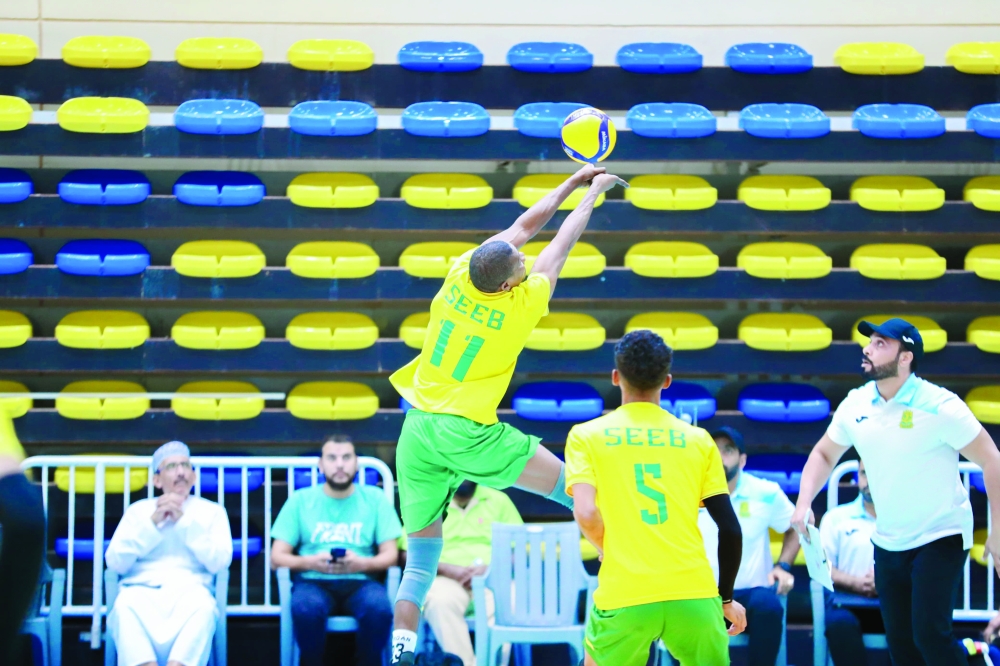 A Seeb player makes a return shot.