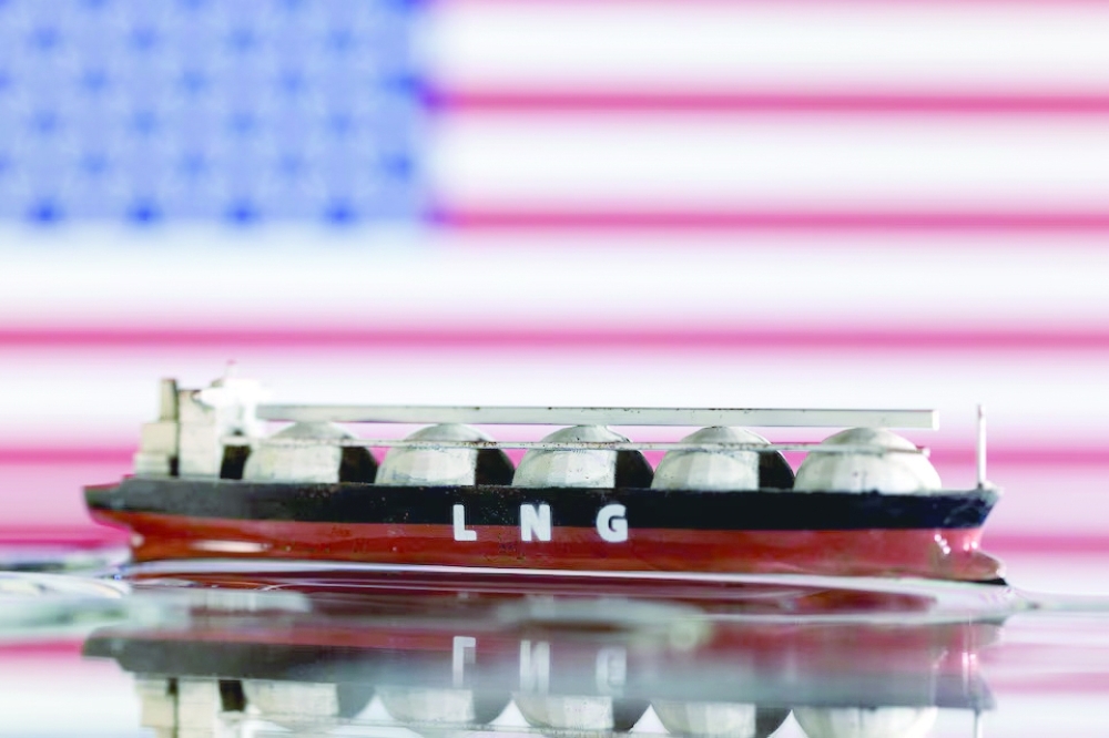 The Model of LNG tanker is seen in front of the US flag in this illustration. — Reuters