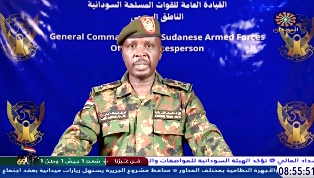 A Sudanese army spokesperson gives a statement on Sudan TV, after, according to the Sudanese army, they took control of the presidential palace, at