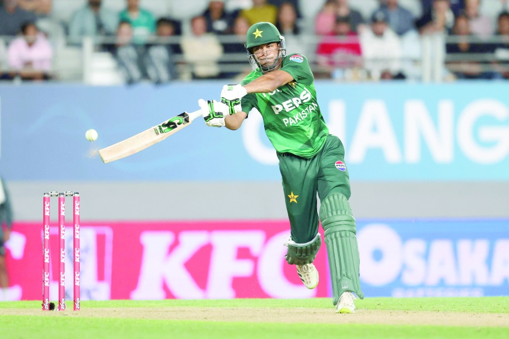 Pakistan's Hasan Nawaz bats during the third T20 international cricket match between New Zealand and Pakistan at Eden Park in Auckland on March 21, 2025. (Photo by Michael Bradley / AFP)


