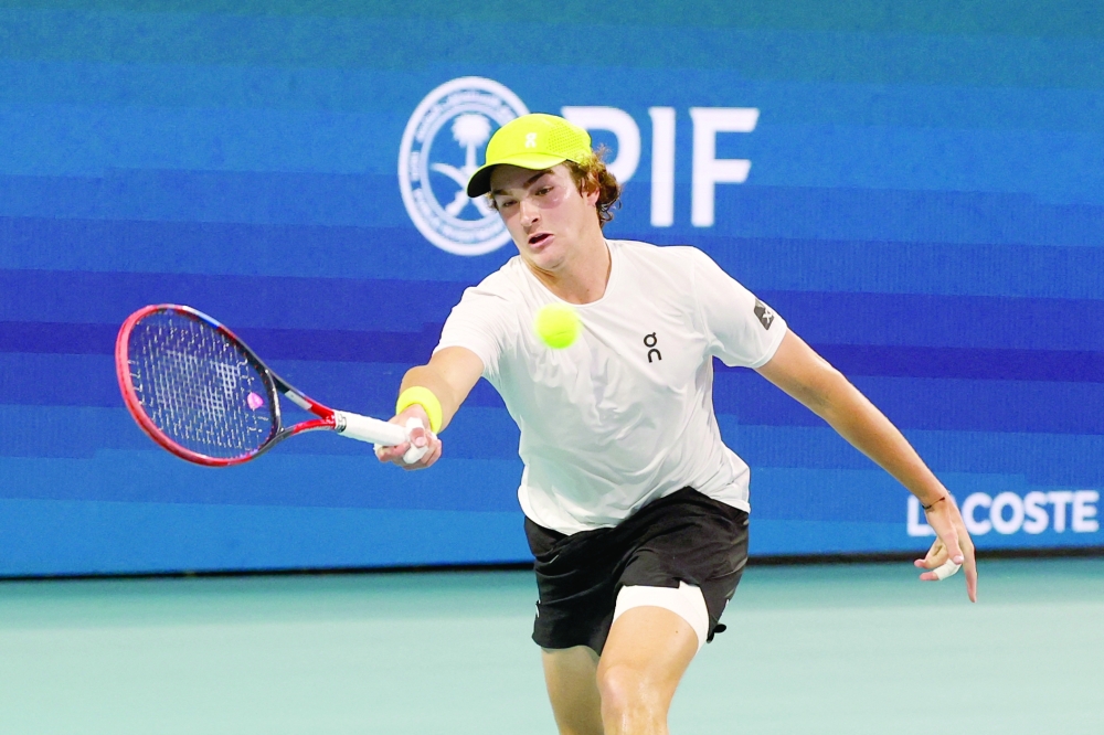 Mar 20, 2025; Miami, FL, USA; Joao Fonseca (BRA) reaches for a forehand against Learner Tien (USA)(not pictured) on day three of the Miami Open at Hard Rock Stadium. Mandatory Credit: Geoff Burke-Imagn Images
