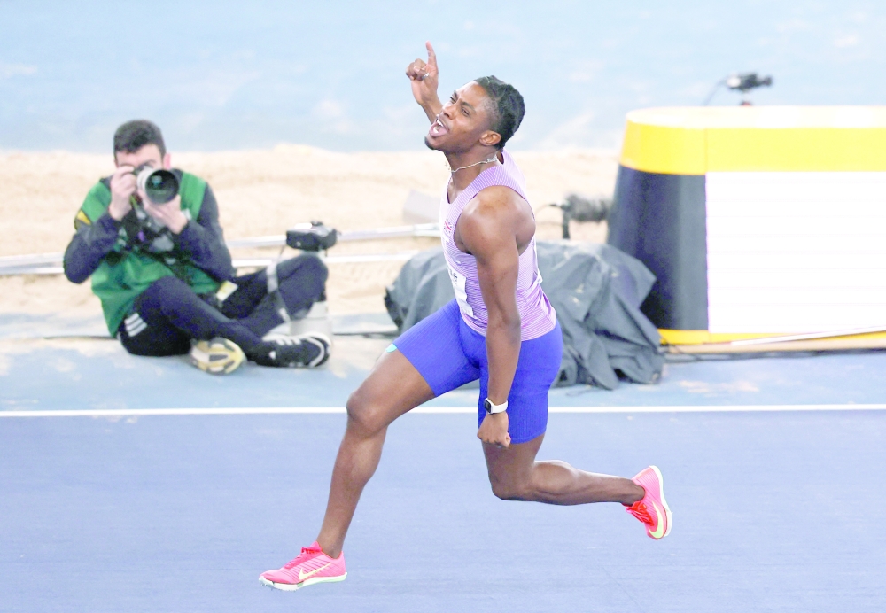 Britain's Jeremiah Azu celebrates after winning the Men's 60m Final.