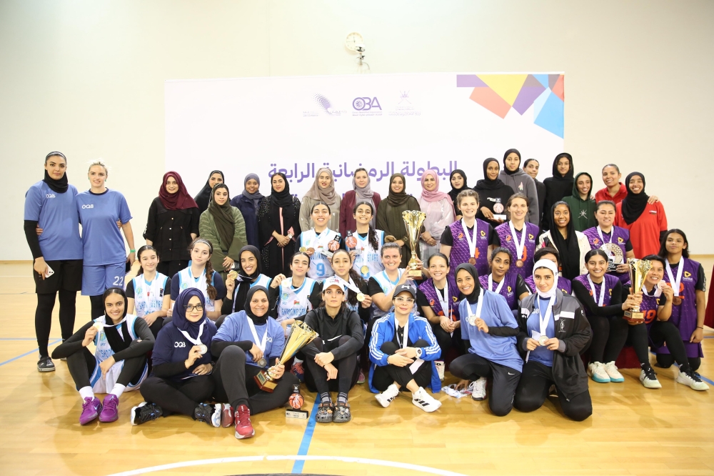 The top three winners pose with the chief guest and officials.