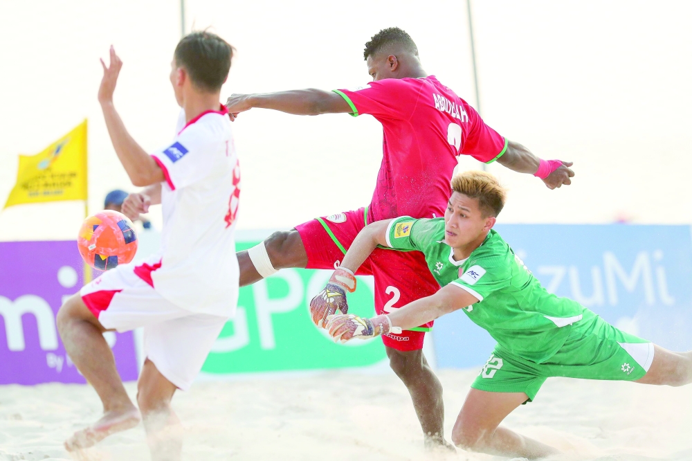 Oman and Vietnam players in action.