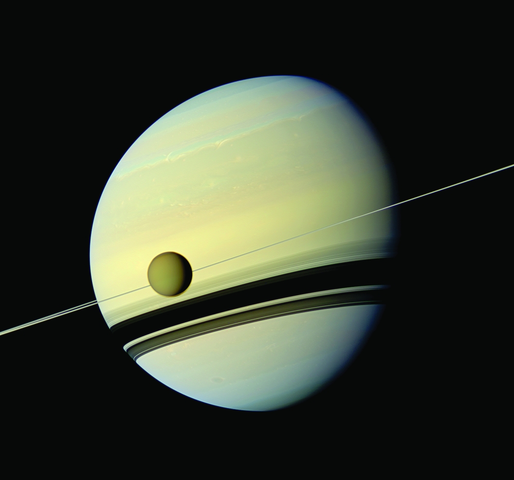 Titan, Saturns largest moon, measures 3,200 miles, or 5,150 kilometers, across and is larger than the planet Mercury. (NASA/JPL-Caltech, via Space Science Institute  via The New York Times)