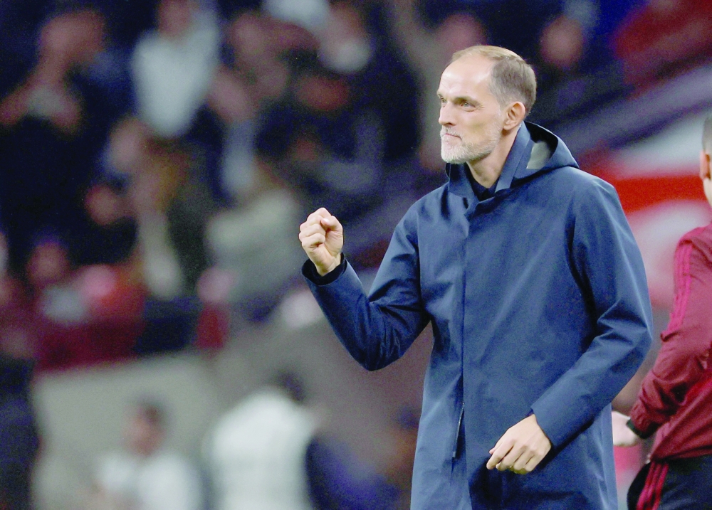 England manager Thomas Tuchel celebrates after Myles Lewis-Skelly scores their first goal. — Reuters