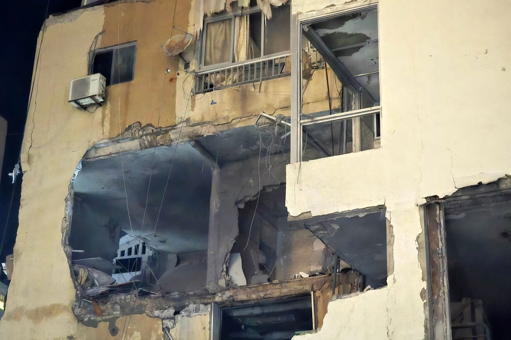This picture shows the damage following an Israeli strike in the southern Lebanese city of Tyre. — AFP