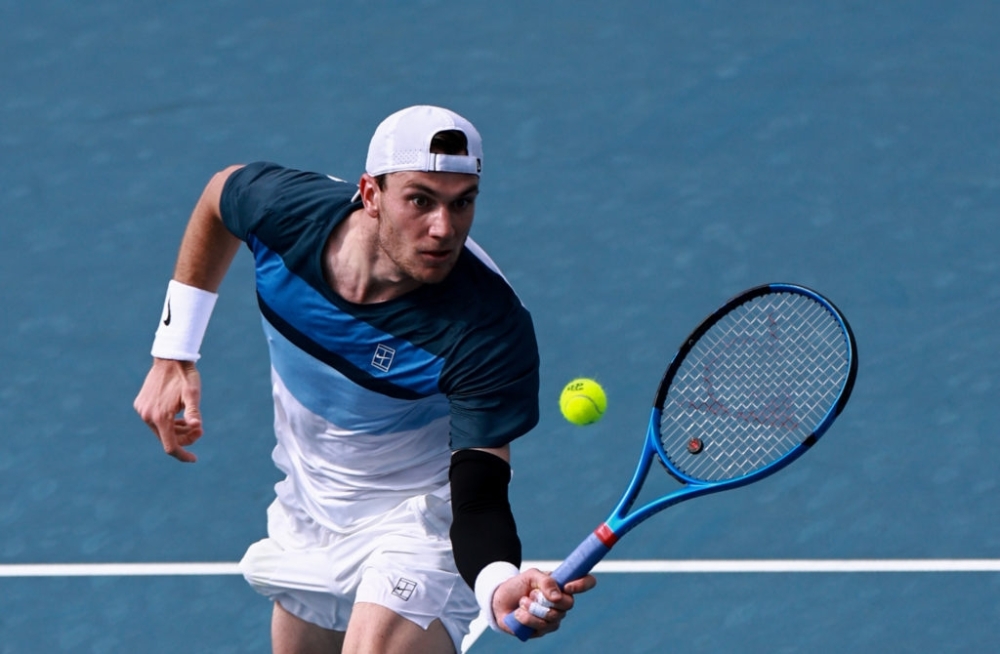 Czech Jakub Mensik hits a forehand against Jack Draper on day five of the Miami Open at Hard Rock Stadium. — Reuters