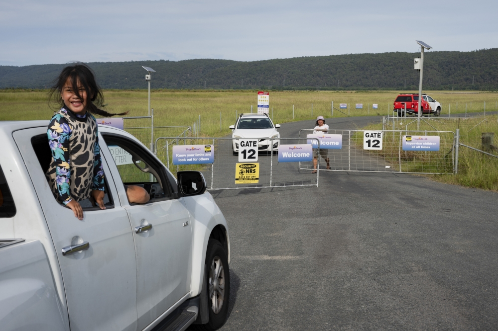 Visitors wait for Penrith Beach, also known as Pondi, to open, 50 miles inland from Sydney, Australia, March 16, 2025. (Matthew Abbott/The New York Times)
