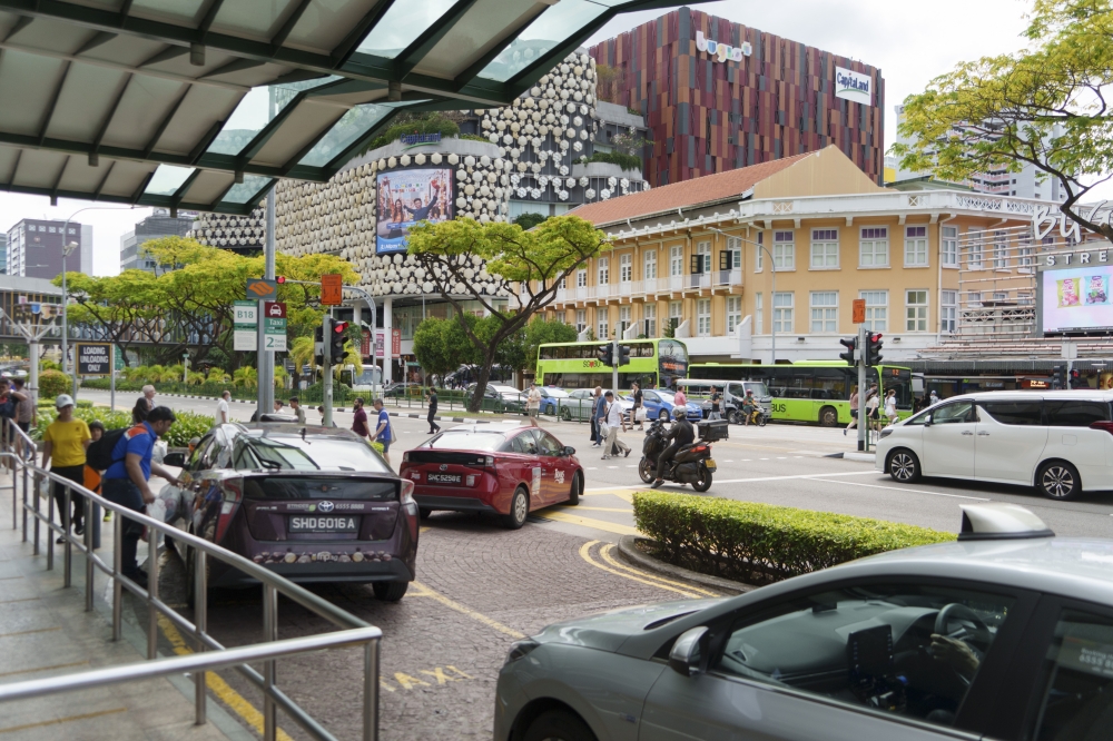 A taxi stand at a mall in Singapore, March 11, 2025. (Chang W. Lee/The New York Times)