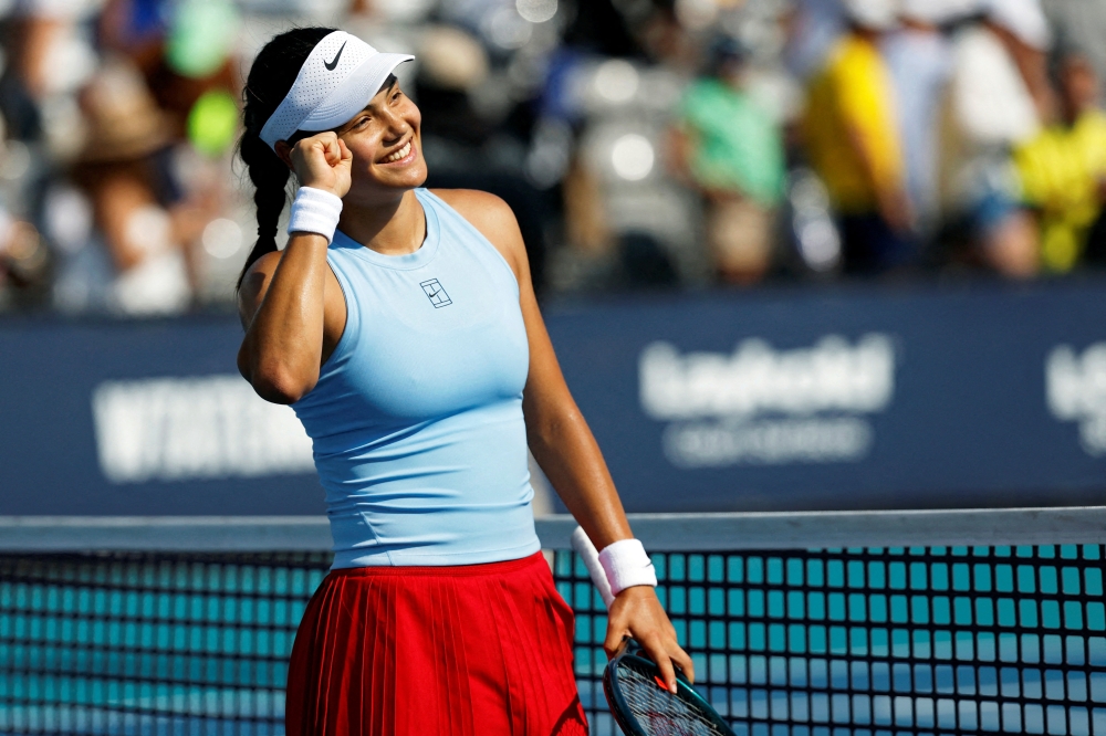 Mar 24, 2025; Miami, FL, USA; Emma Raducanu (GBR) celebrates after her match against Amanda Anisimova (USA)(not pictured) on day seven of the Miami Open at Hard Rock Stadium. Mandatory Credit: Geoff Burke-Imagn Images     TPX IMAGES OF THE DAY
